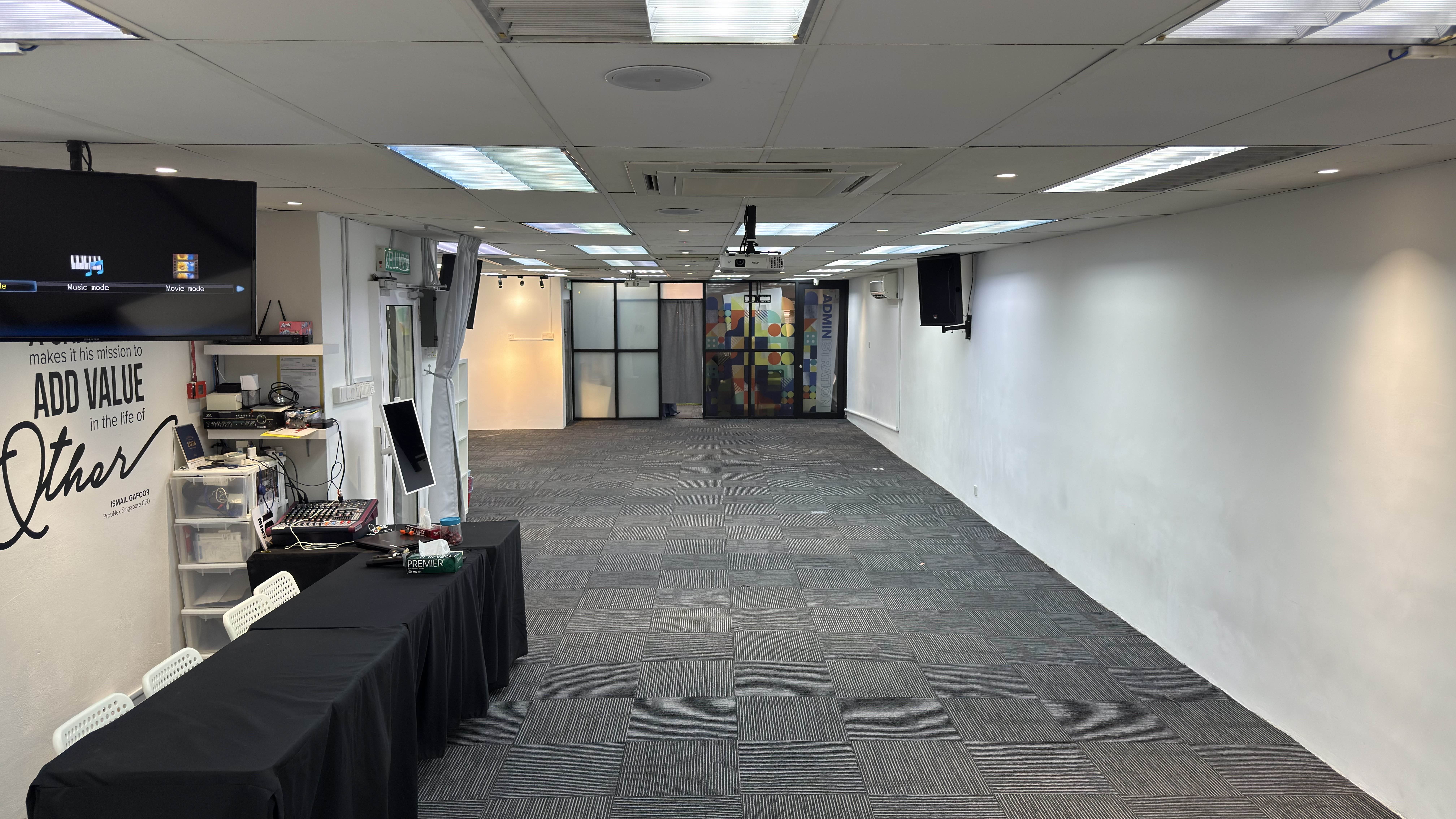 Training hall toward the main doors and glass wall at the far end